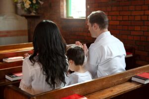 Father Grant leading a service at Holy Family Cathedral in Tulsa.